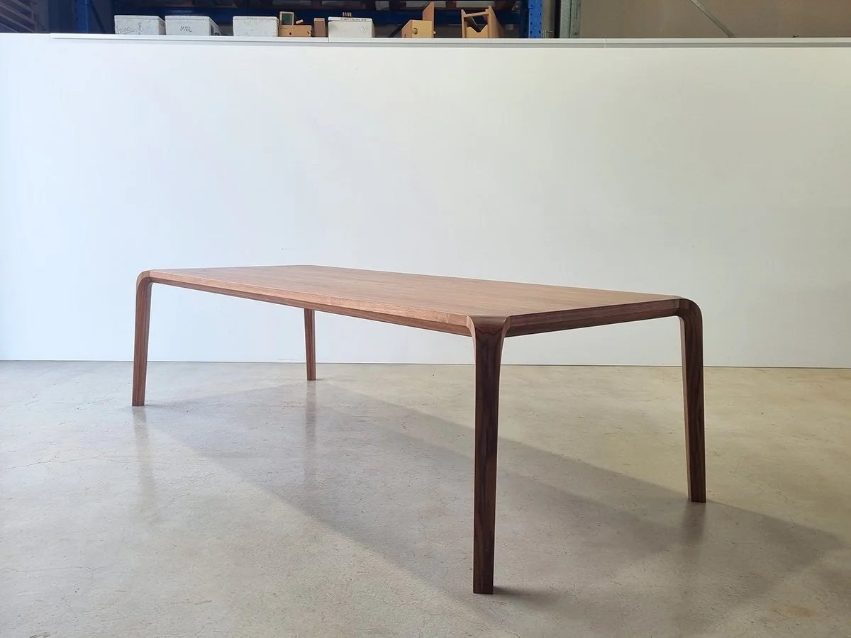 Araluen Desk in American and French Oak, full side view against plain studio wall - Nathan Day Design