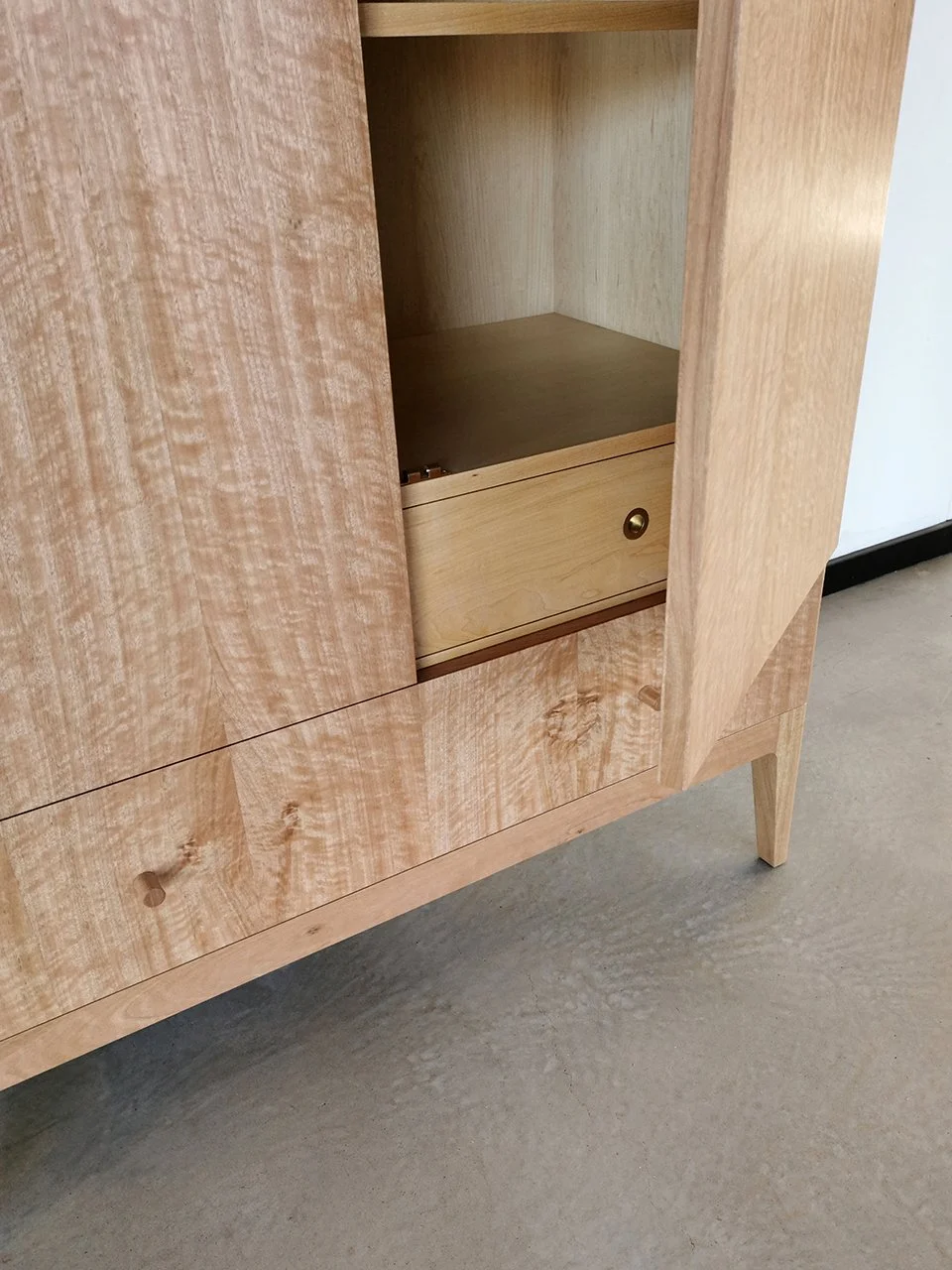 Gifford Rd Cabinet in WA Blackbutt, close-up angled corner detail with internal drawer visible - Nathan Day Design