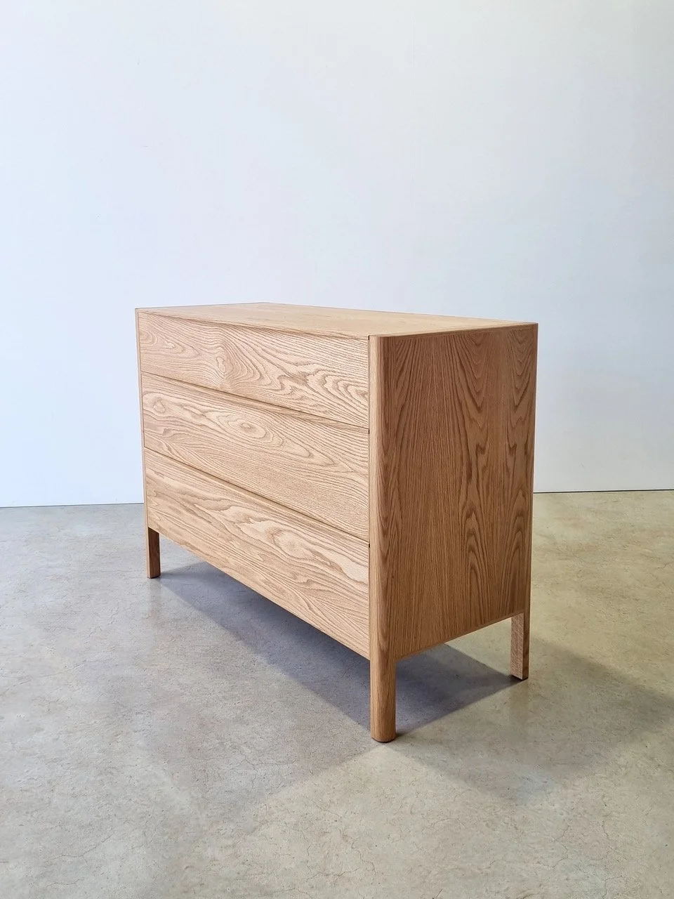 Hampden Chest of Drawers in American Oak - Nathan Day Design, full front-on studio shot, medium finish