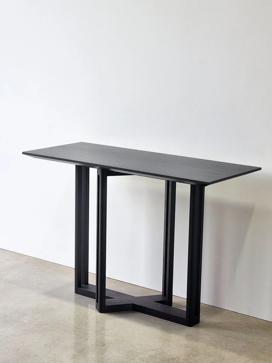 Giacci Console Table in ebonised Jarrah, front view in studio setting - Nathan Day Design