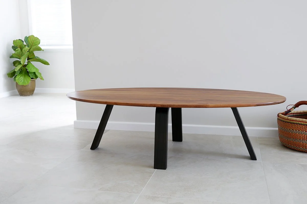 Longitude 131 custom furniture in Tasmanian Blackwood - Nathan Day Design, elongated oval side table with black steel legs in studio setting