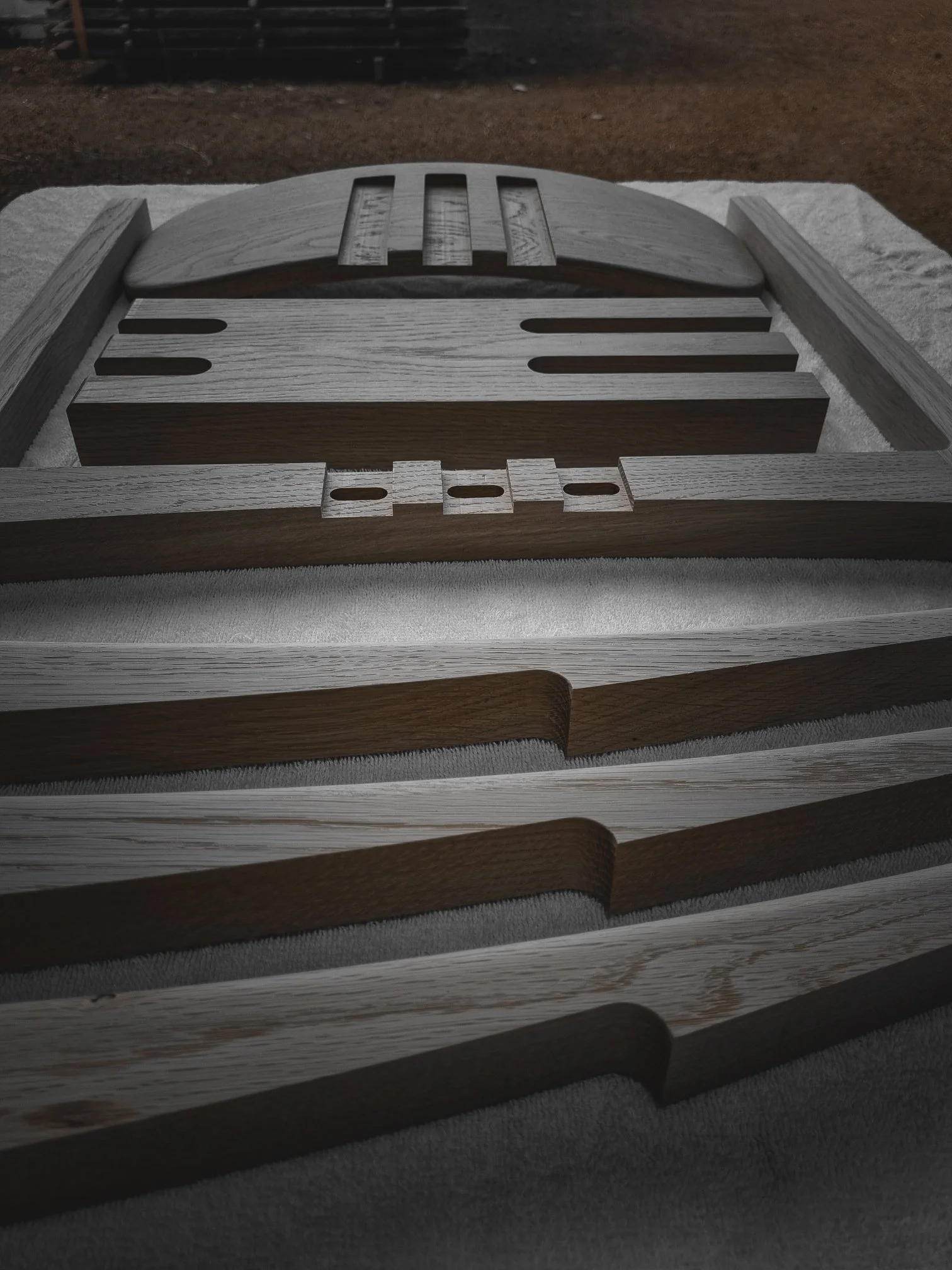 Fluted timber panel components stacked and ready for assembly at the Nathan Day Design workshop