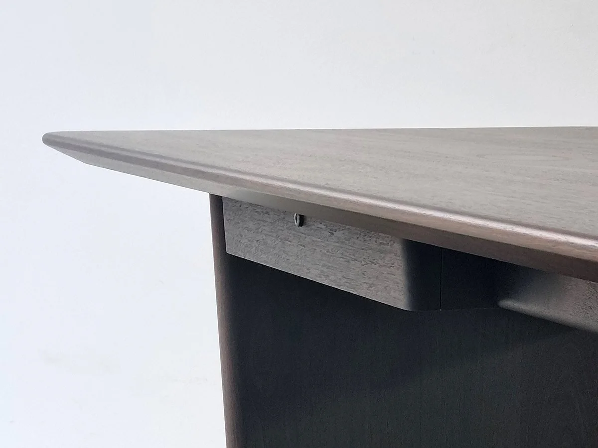 Morey Desk in ebonised Jarrah, close-up profile view of tabletop edge and drawer recess - Nathan Day Design