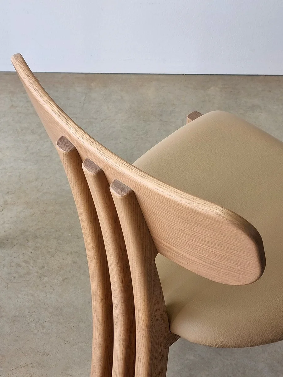 Close-up detail of Tulip Chair's American Oak vertical slat backrest joinery, showing hand-crafted curved profile - Nathan Day Design bespoke furniture