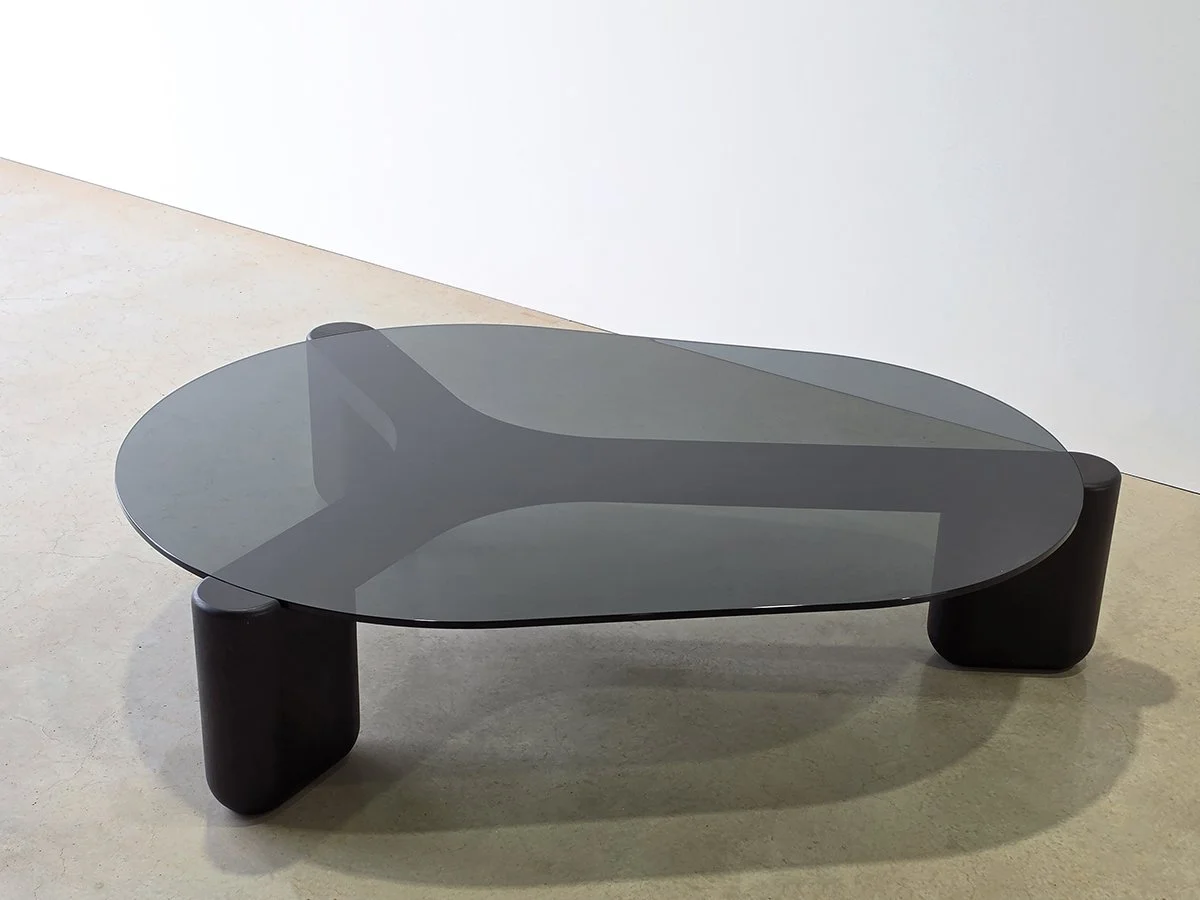 Detail of the Hippo Coffee Table's rounded sculptural leg form in ebonised jarrah - Nathan Day Design