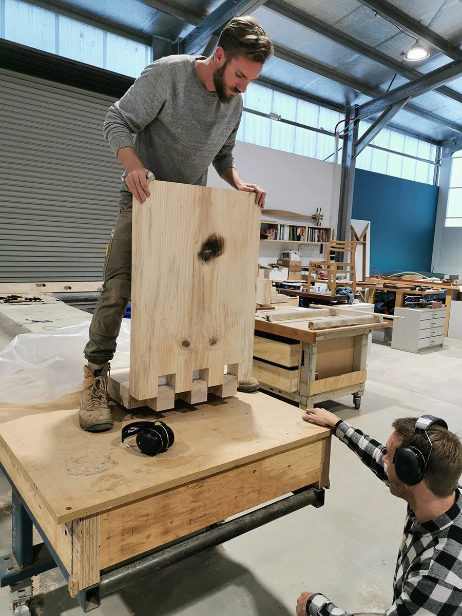 Scorched Buffet in scorched Norfolk Island Pine, workshop process shot finishing a carcass panel - Nathan Day Design