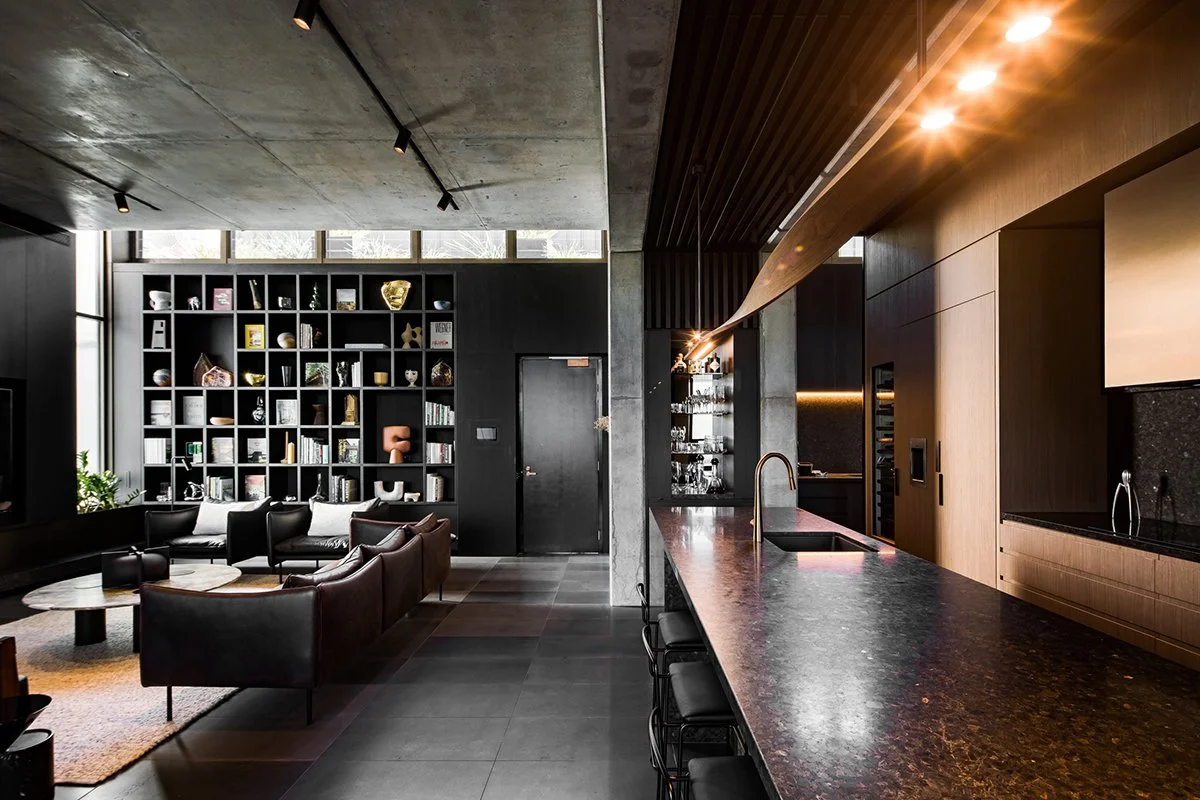 Ernest Pendant Light in Ash, elongated blade-form design - Nathan Day Design, wide lifestyle shot in industrial-style residence with concrete ceiling