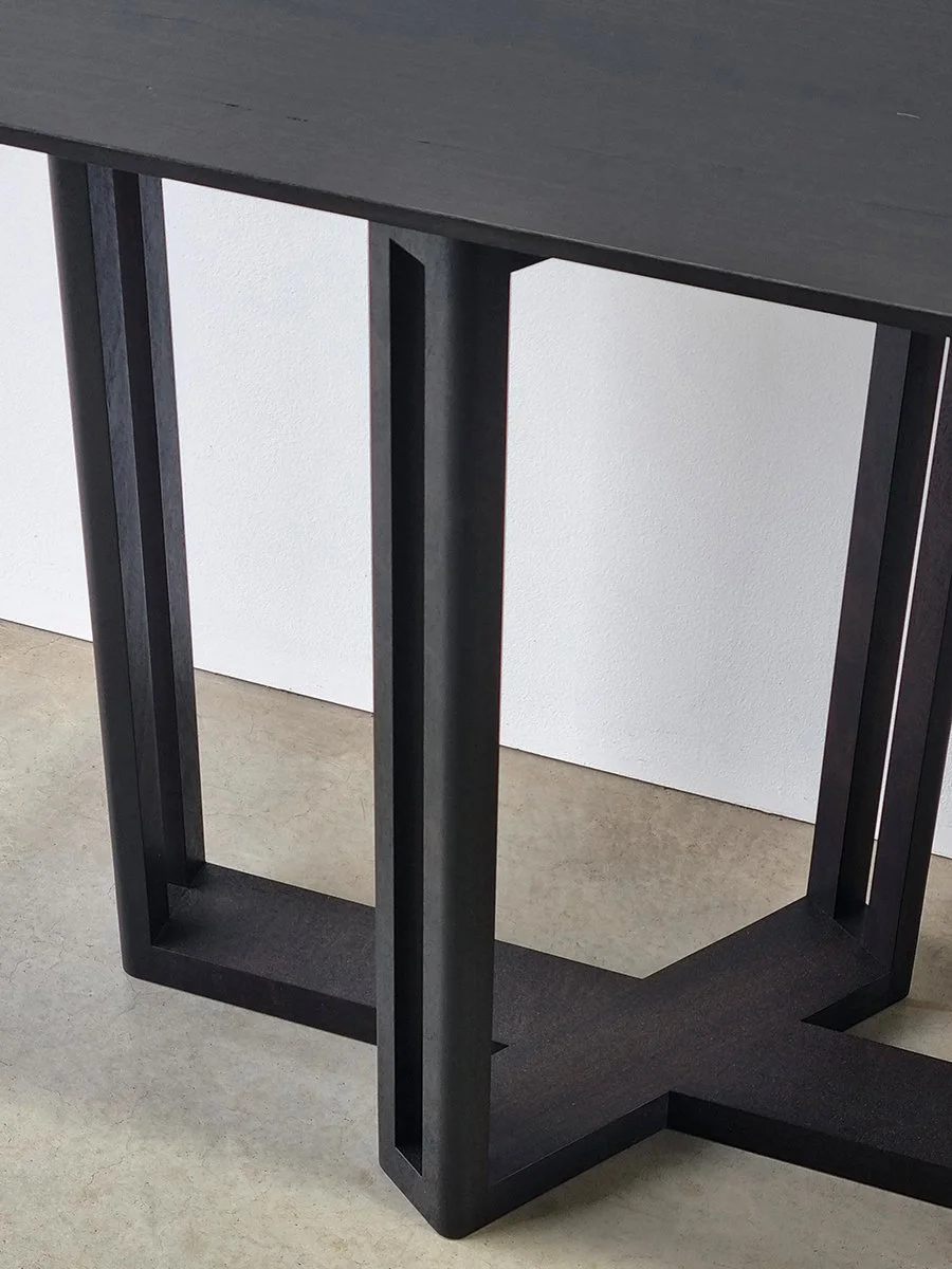 Giacci Console Table in ebonised Jarrah, close-up detail of cross-leg base joinery - Nathan Day Design