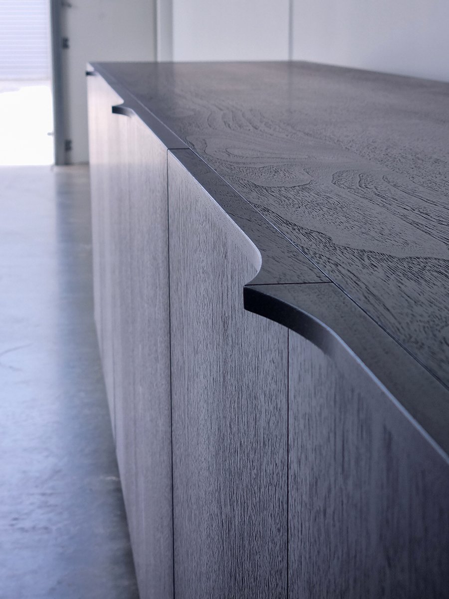 Honeycombs Cabinet in ebonised Walnut, close-up detail of the curved top edge - Nathan Day Design