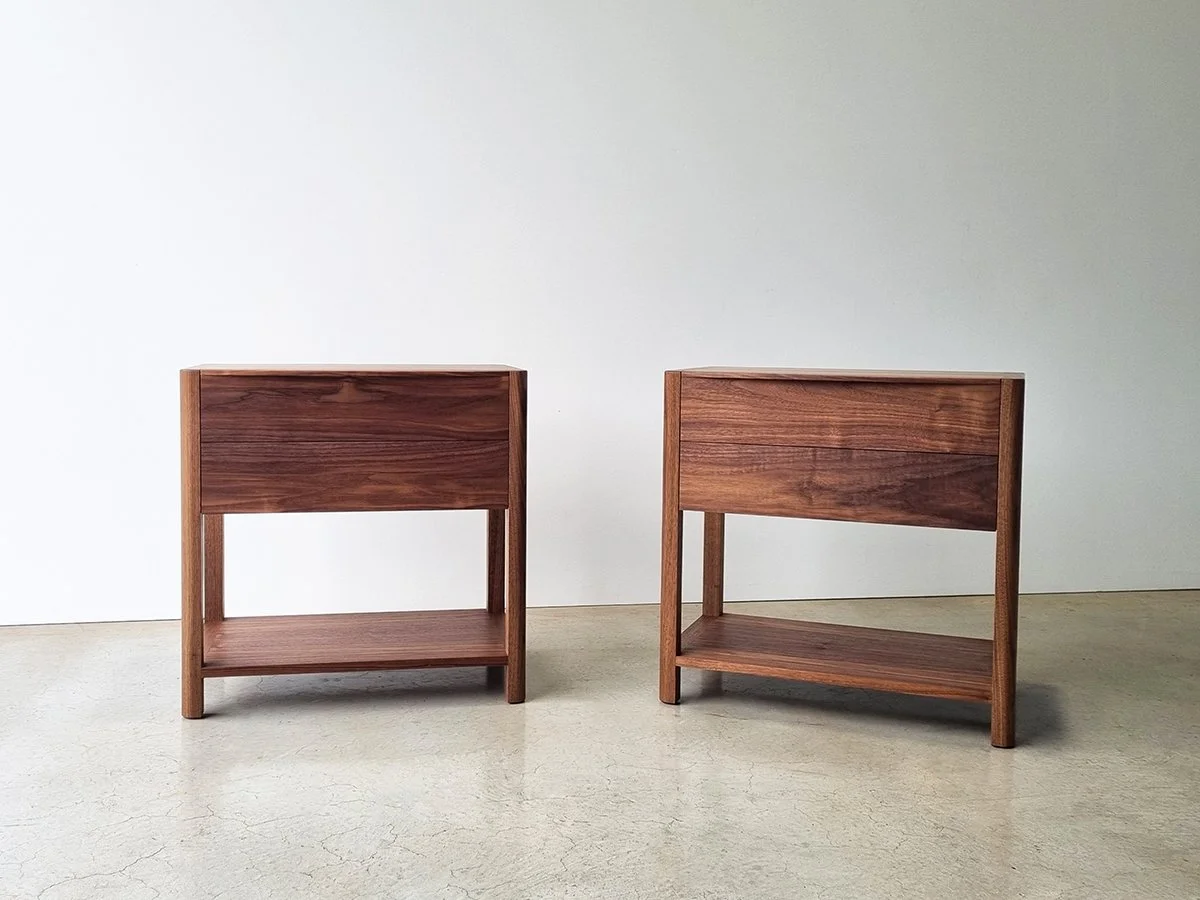 Hampden Twin Drawer Bedside in Walnut - Nathan Day Design, pair of tables in studio showing open-leg shelf design