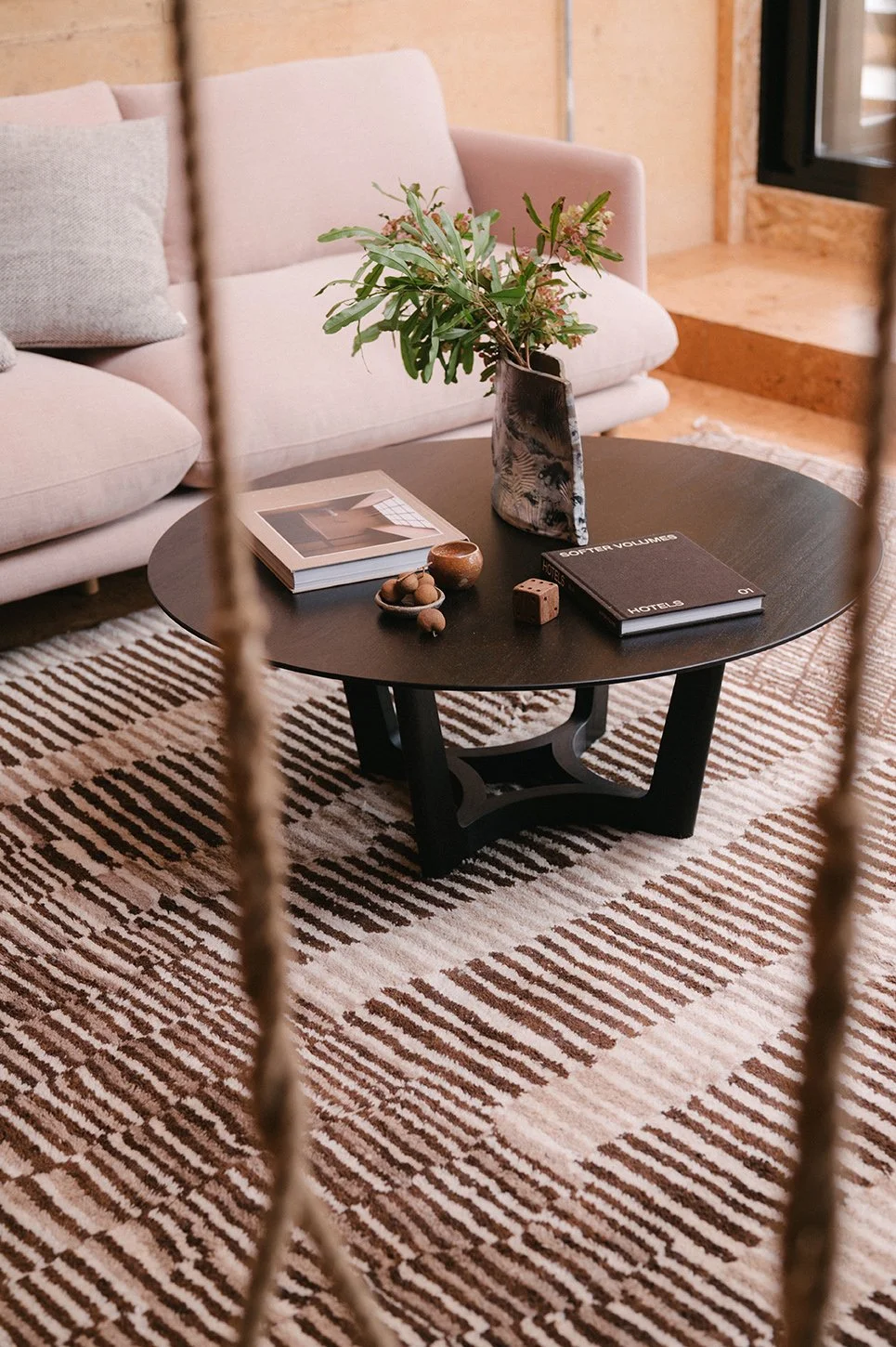 Froxfield Coffee Table in dark timber styled in a living room setting - bespoke coffee table by Nathan Day Design