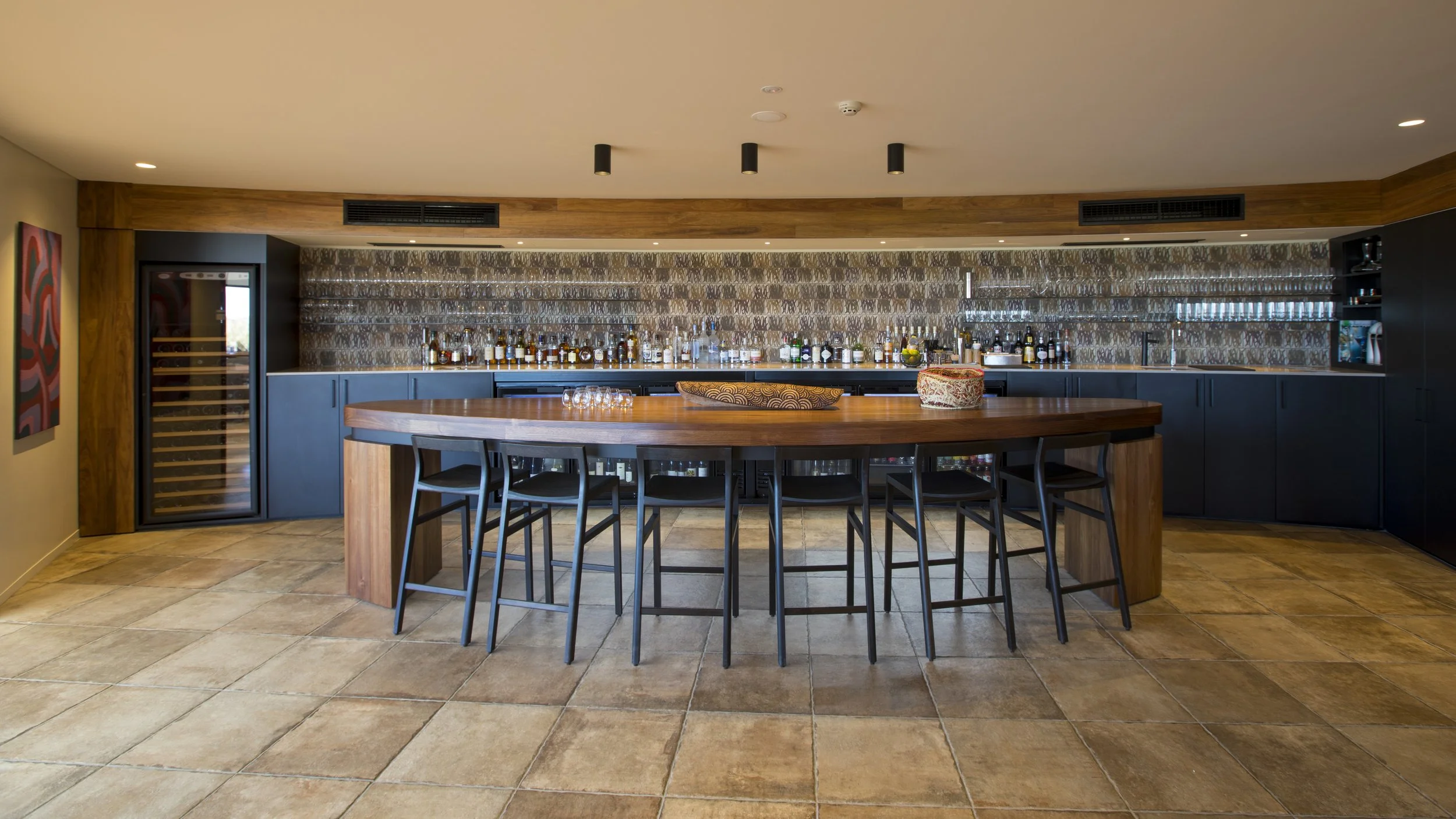 Longitude 131 custom furniture in Tasmanian Blackwood - Nathan Day Design, full bar counter with stools in resort lounge