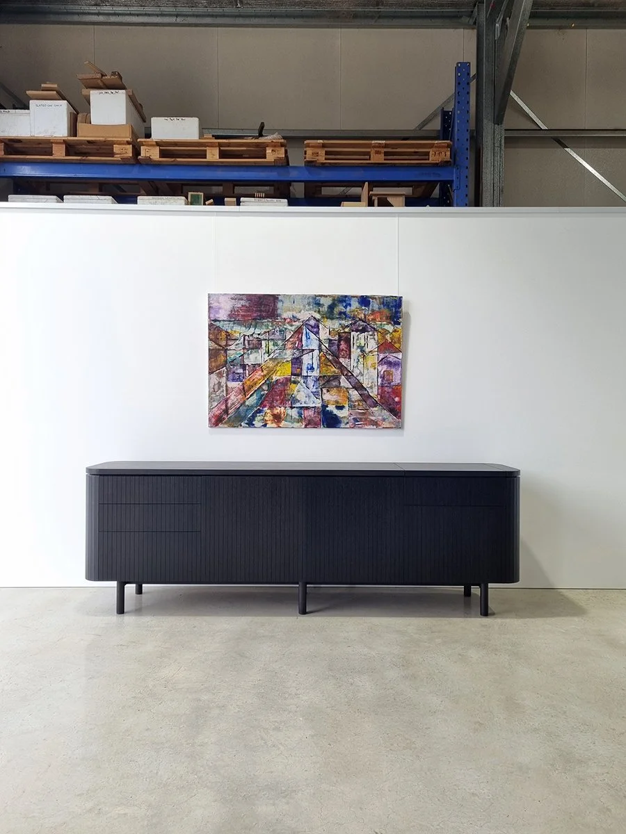 Freeman Loop Credenza in ebonised and natural Walnut, full side view closed, plain studio setting - Nathan Day Design