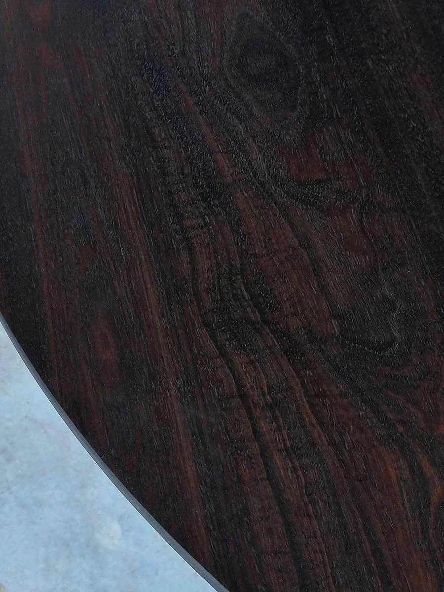Close-up of the Froxfield Table's ebonised Jarrah tabletop grain and edge - Nathan Day Design