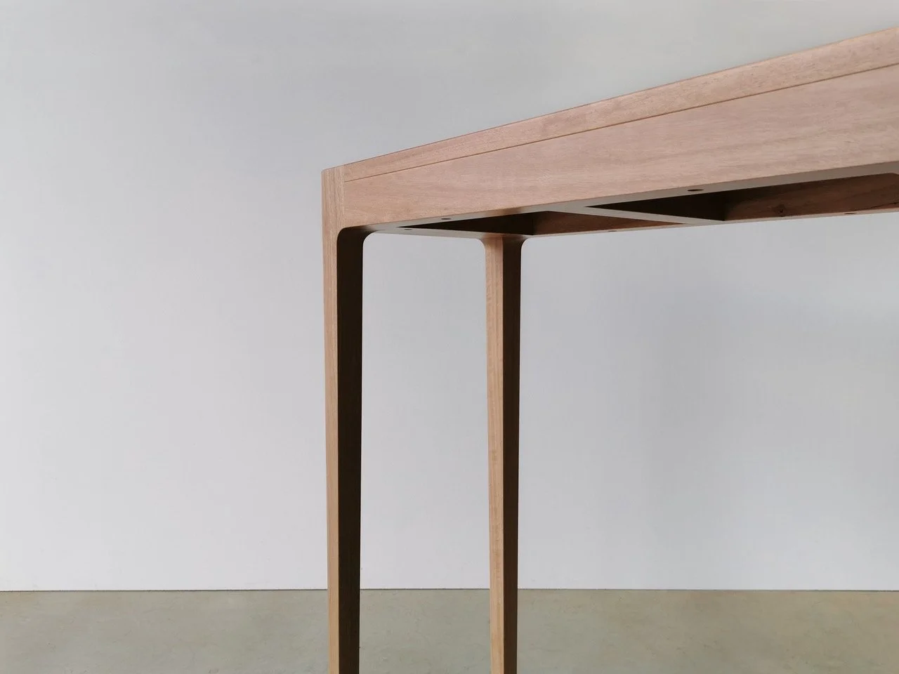 Louis Console in WA Blackbutt, close-up angled leg joinery detail, natural finish - Nathan Day Design