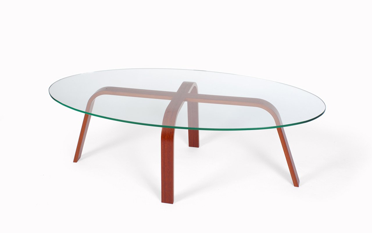 Over the Falls Coffee Table in Jarrah with glass top, showing the curved laminated leg design - Nathan Day Design