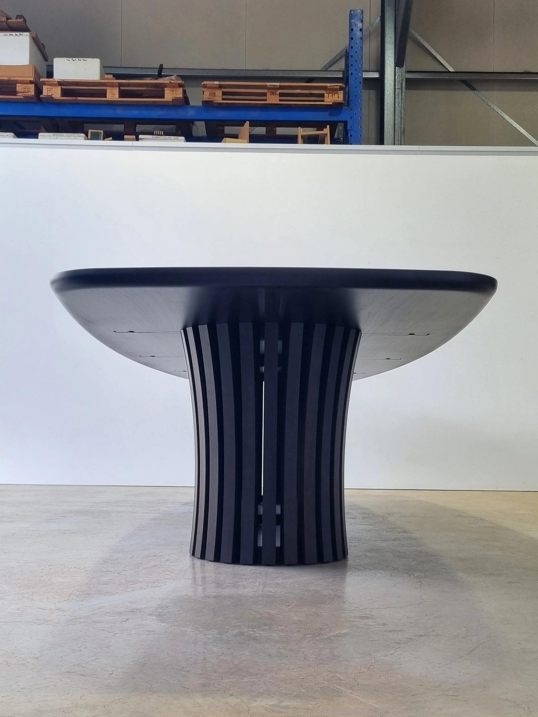 Round Boundary Lane Table in ebonised Jarrah, smaller-scale version with the fluted pedestal base - Nathan Day Design