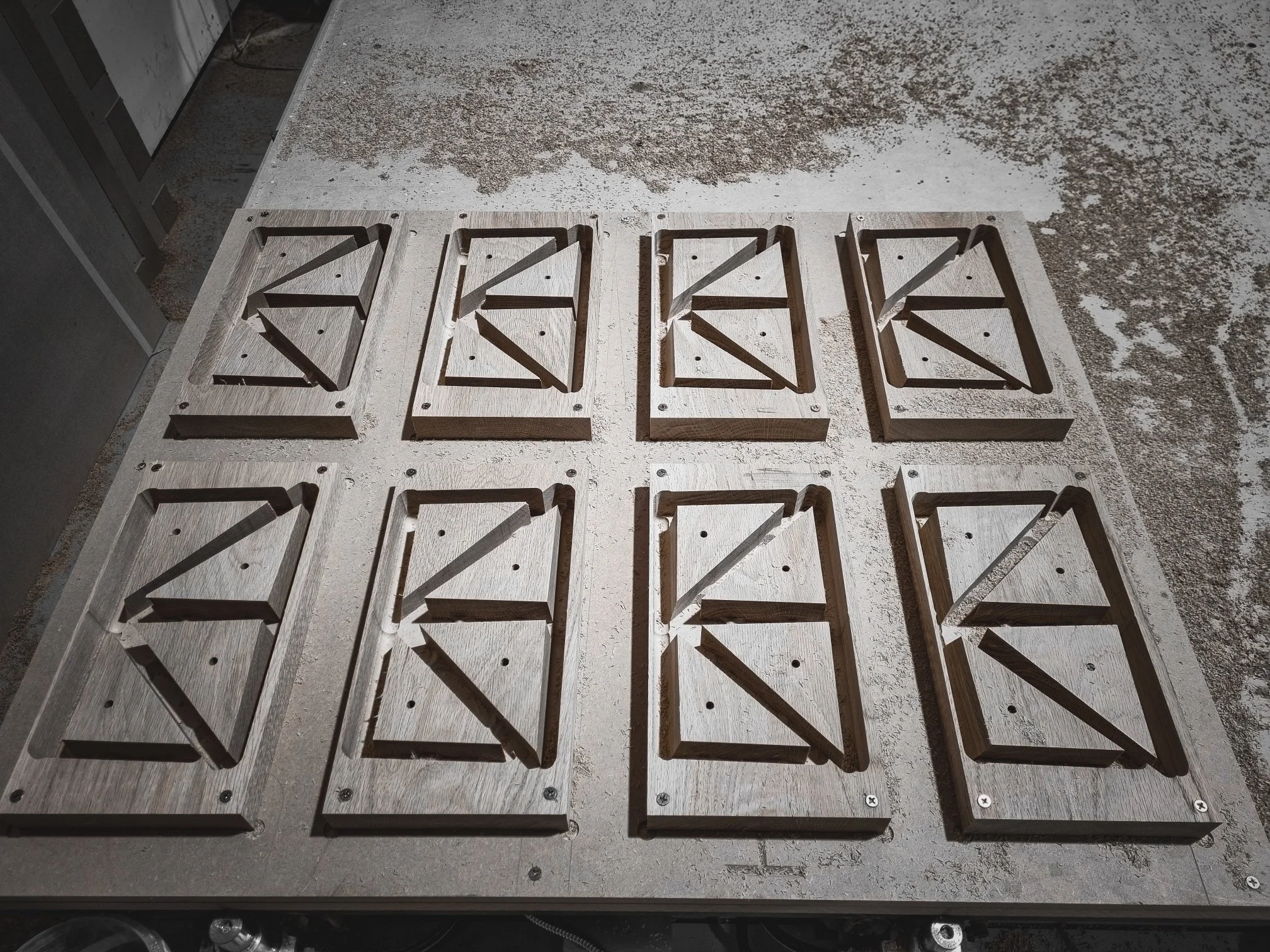 Custom steel bending jigs used to form fluted timber panels for bespoke Nathan Day Design furniture