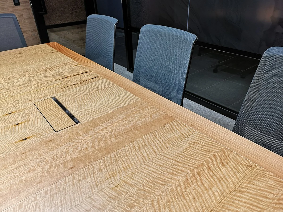 DWER custom furniture in WA Blackbutt - Nathan Day Design, close-up of tabletop with built-in cable pass-through detail