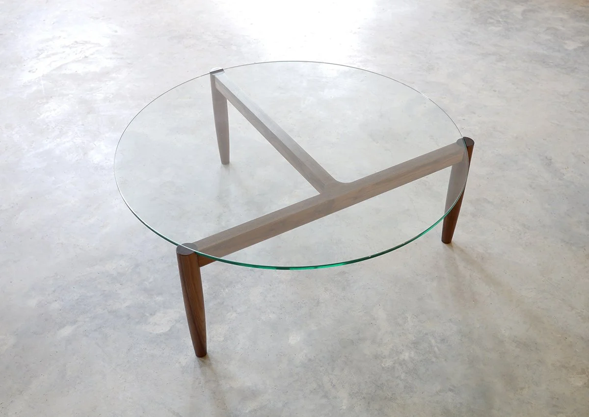 Overhead view of the 3.2.1 Coffee Table's glass top and crossing timber rails - Nathan Day Design