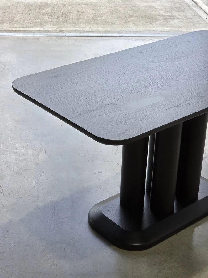 Corner detail of the Coop Nook Table's silk lacquer finish on ebonised Walnut - Nathan Day Design