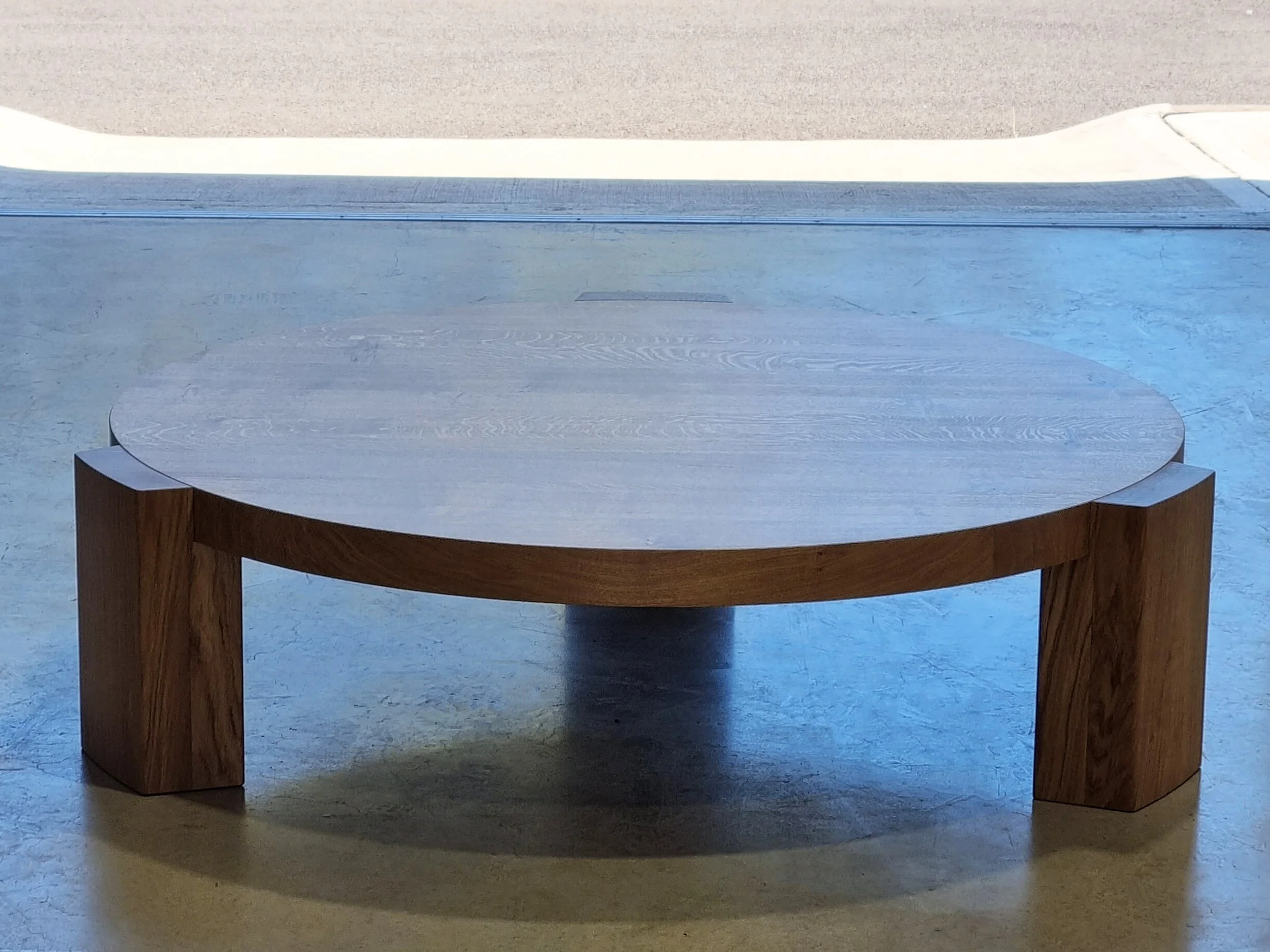 Quindi Coffee Table front view showing the chunky French Oak pedestal base - bespoke furniture by Nathan Day Design