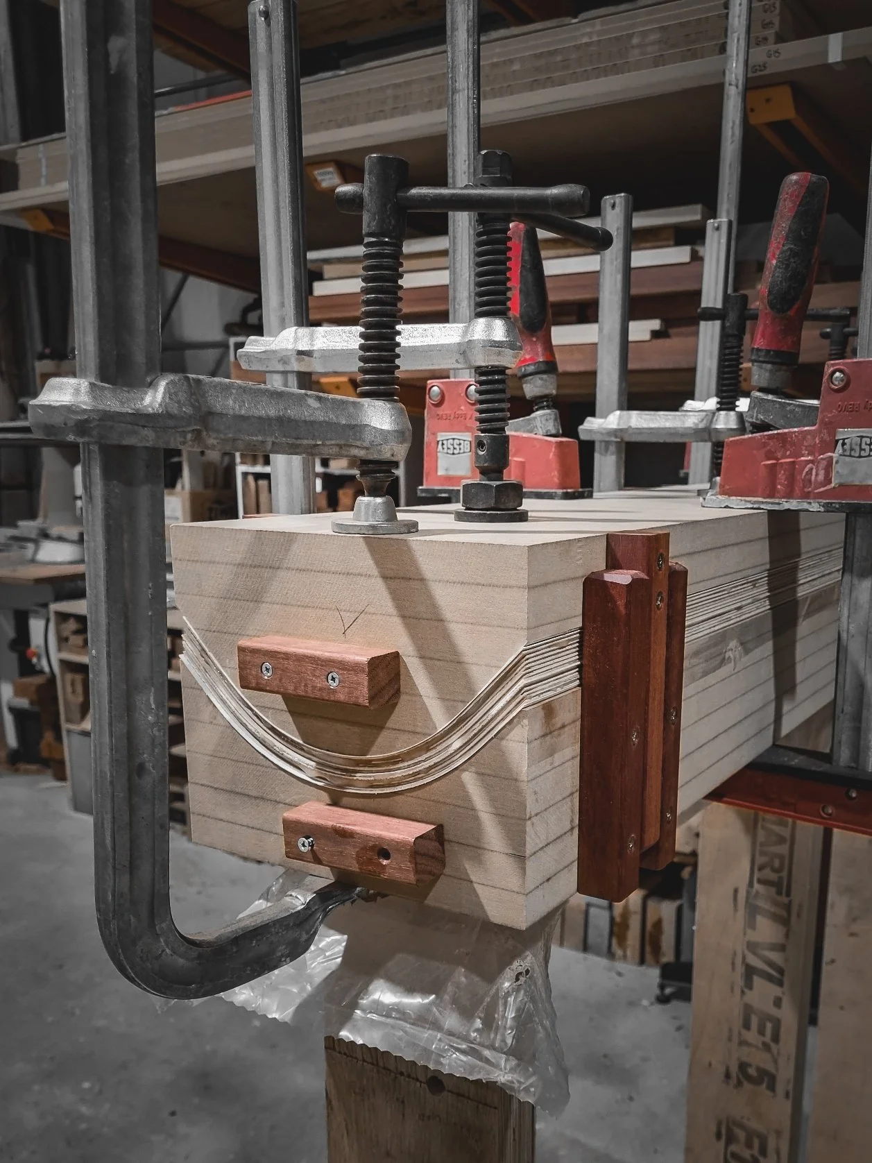 Timber joinery being glued and clamped during construction of a bespoke Nathan Day Design piece