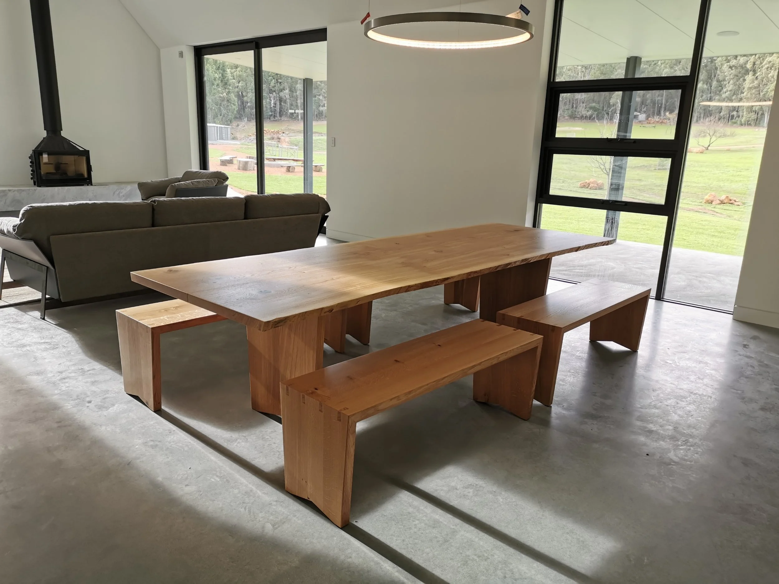 Dovetail Bench in American Oak with exposed dovetail joinery, Nathan Day Design - interior dining setting with chairs