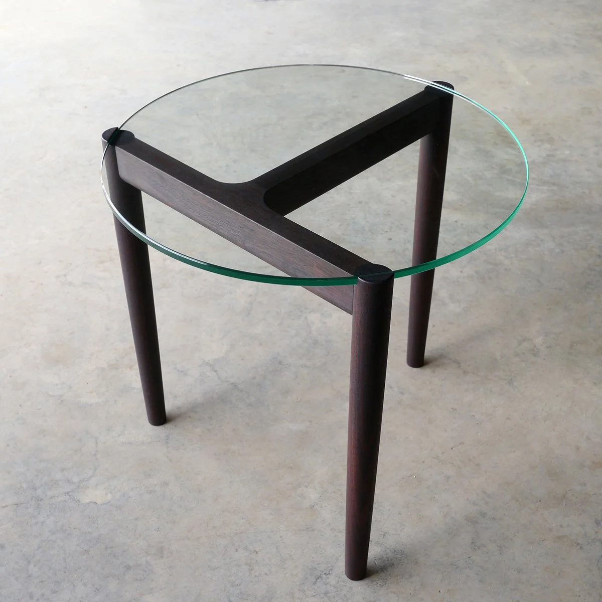 3.2.1 Coffee Table in dark ebonised timber, high angle studio shot showing the full rail joinery - Nathan Day Design