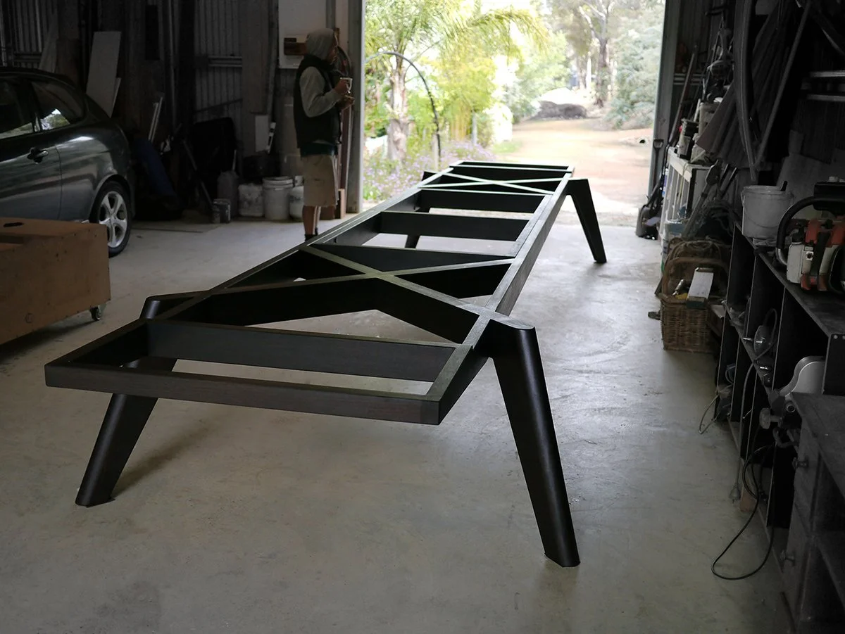 Woods Bagot Boardroom Table in ebonised Jarrah - Nathan Day Design, standalone view of black steel A-frame leg base before top fitted
