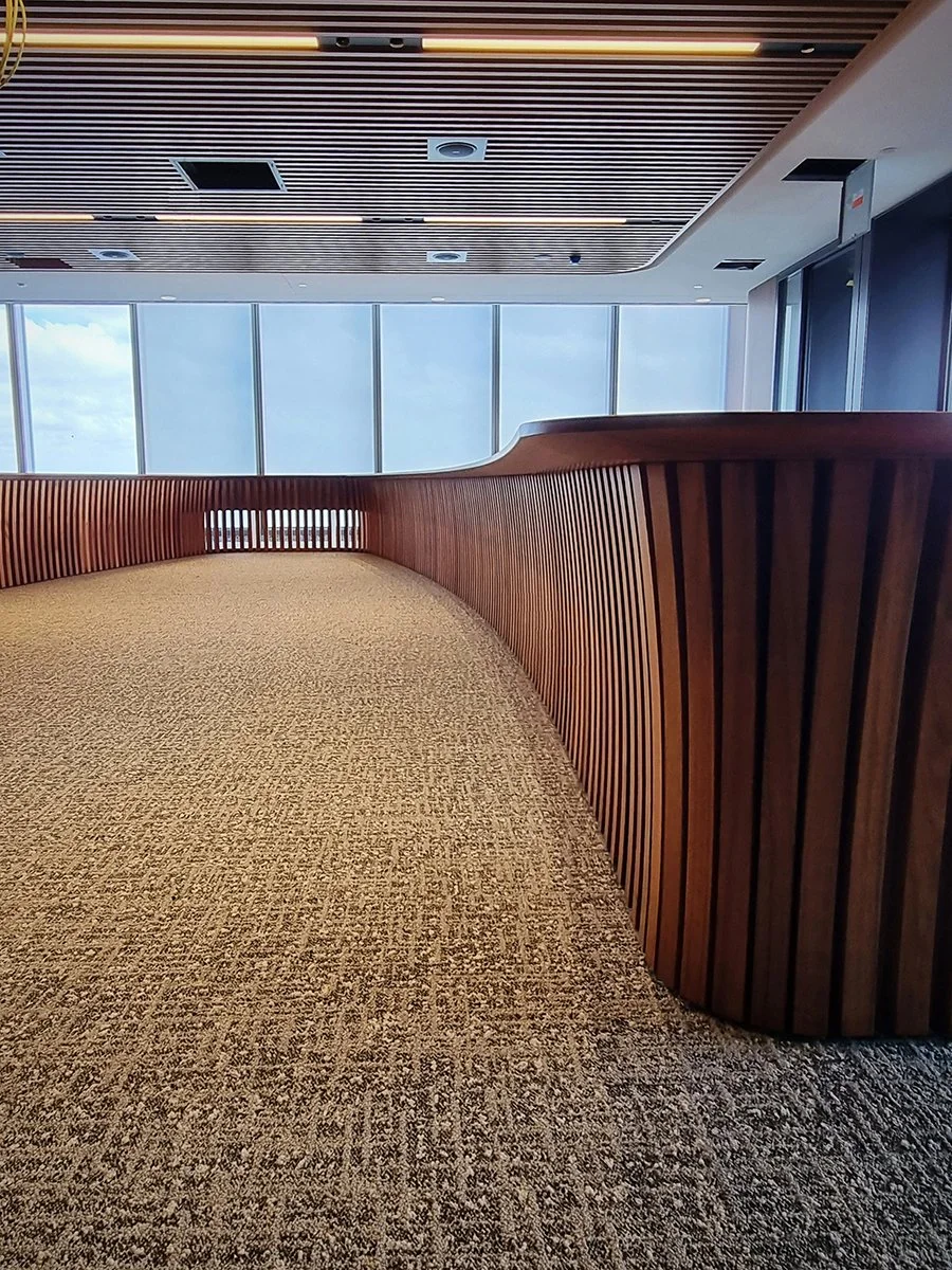 One - The Esplanade Boardroom Table in Australian Blackwood, fluted leg design - Nathan Day Design, close-up of fluted leg base in boardroom setting