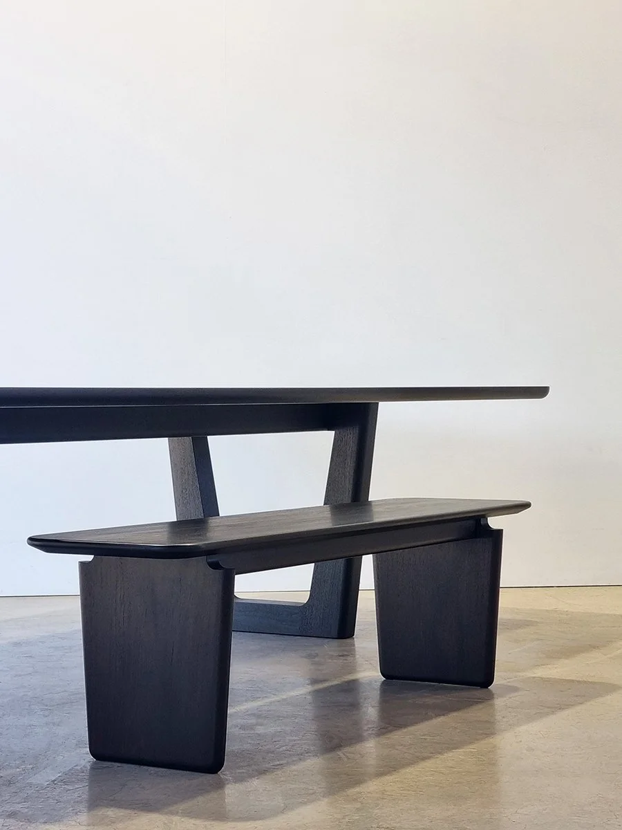 Clairault Outdoor Table in ebonised Jarrah - Nathan Day Design, angled close-up of table and bench leg design