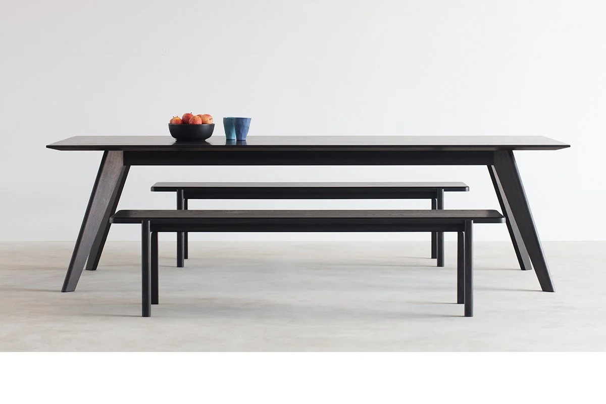 Mel Bench in blackened Oak with matching black dining table, styled lifestyle setting - Nathan Day Design