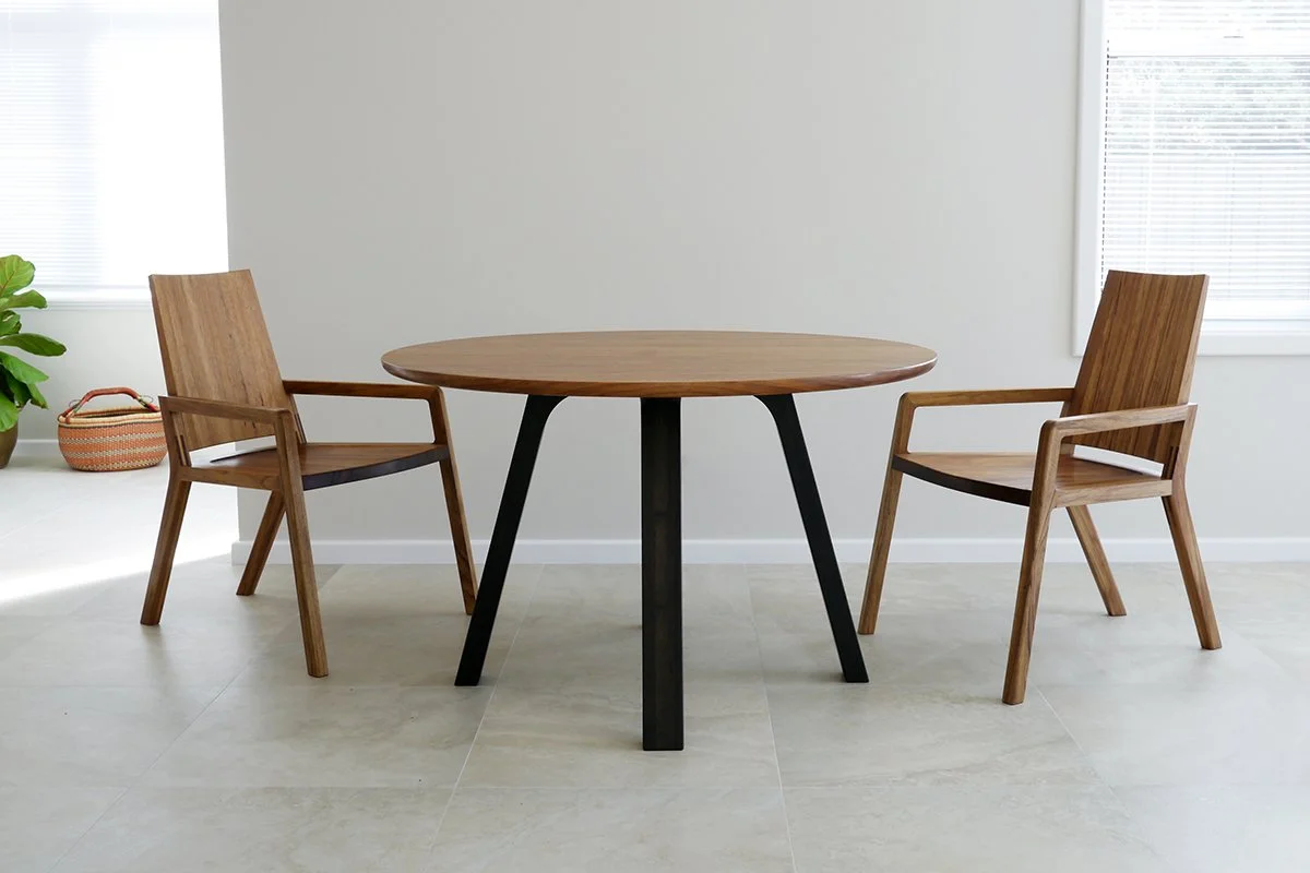 Longitude 131 custom furniture in Tasmanian Blackwood - Nathan Day Design, round dining table with matching timber-frame armchairs