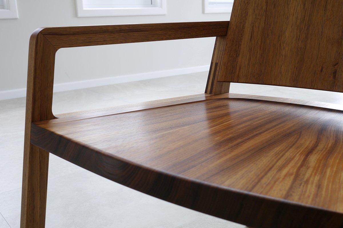 Uluru Chair in Otways Blackwood, Nathan Day Design bespoke furniture - close-up detail on timber floor