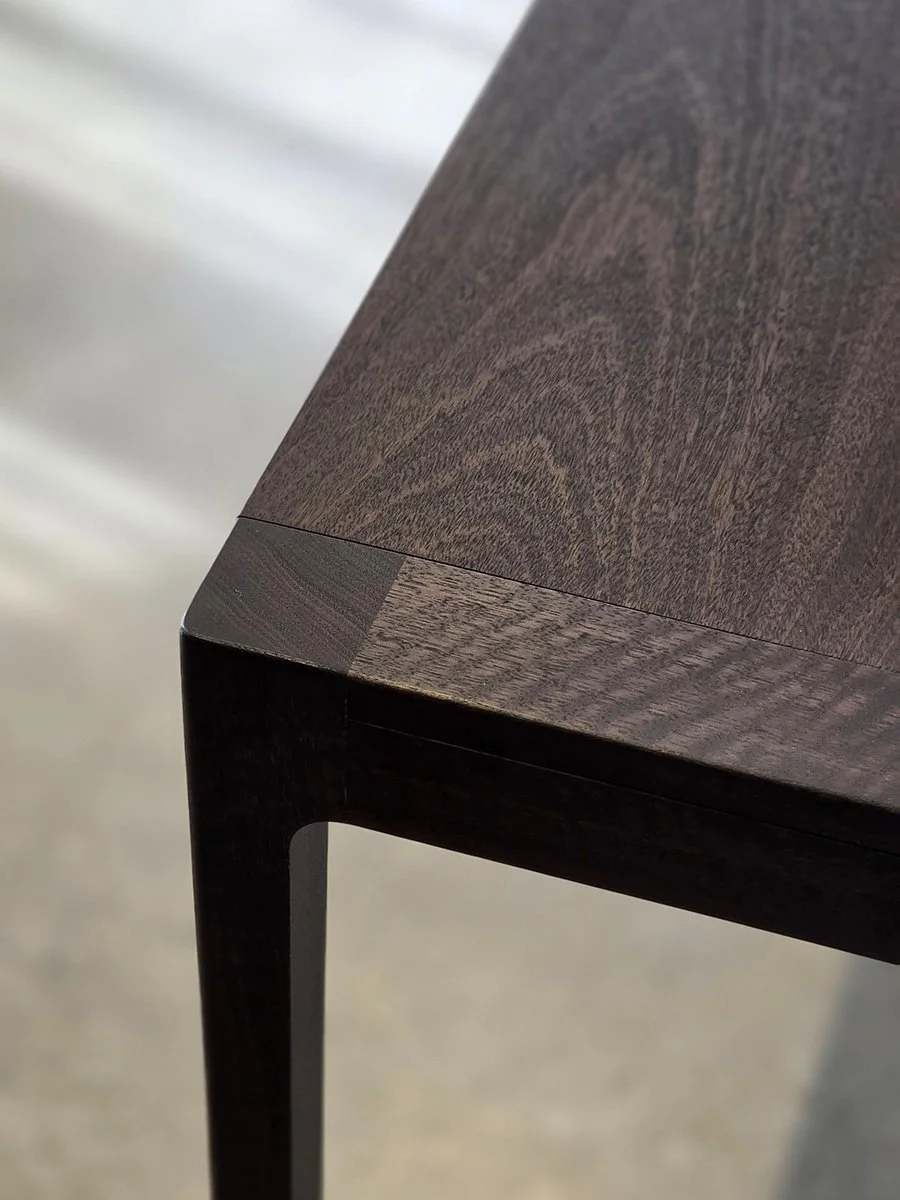 Louis Console in WA Blackbutt, close-up top corner detail showing ebonised grain and mitred joinery - Nathan Day Design