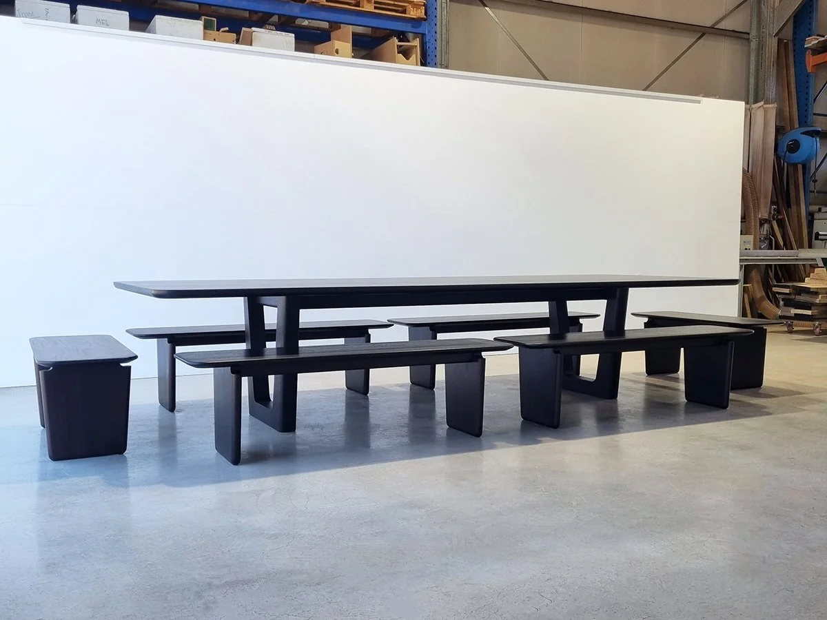 Clairault Outdoor Table in ebonised Jarrah - Nathan Day Design, workshop shot of full table and bench set
