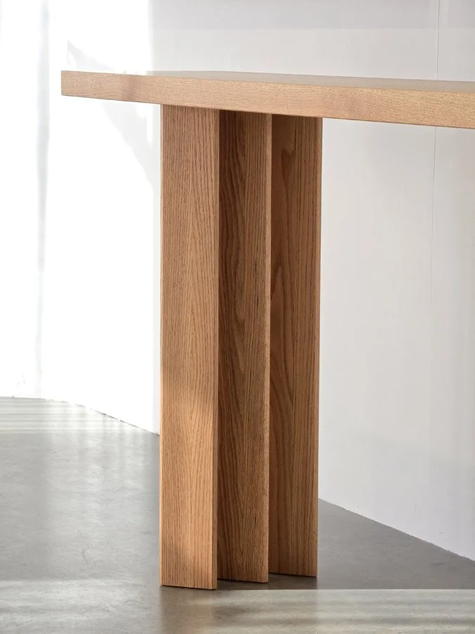 Prism Console in Red Oak, front-on view against plain studio wall - Nathan Day Design