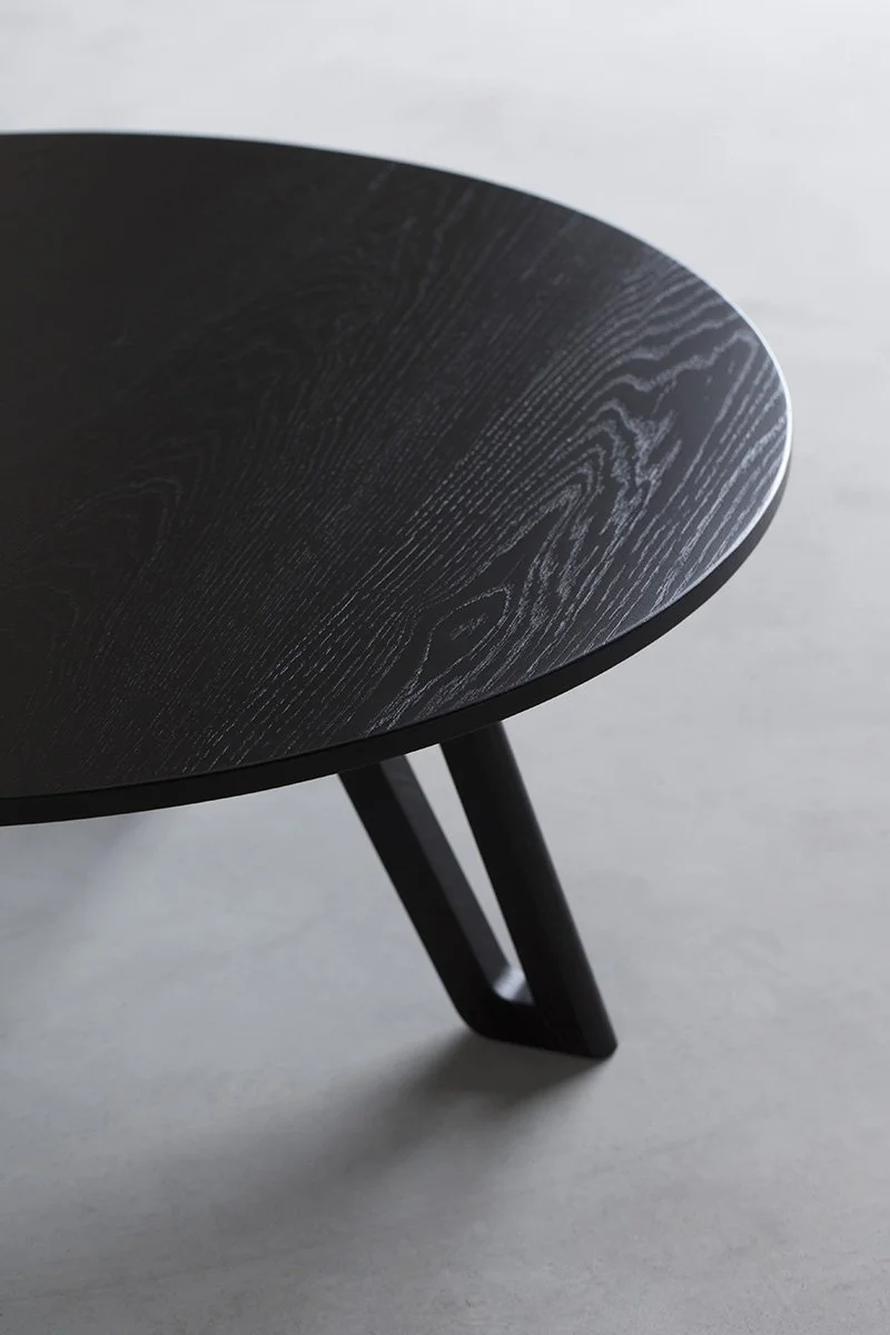 Detail of the Quarterlight Coffee Table's signature leg cutout, referencing the Kombi van quarterlight window - Nathan Day Design