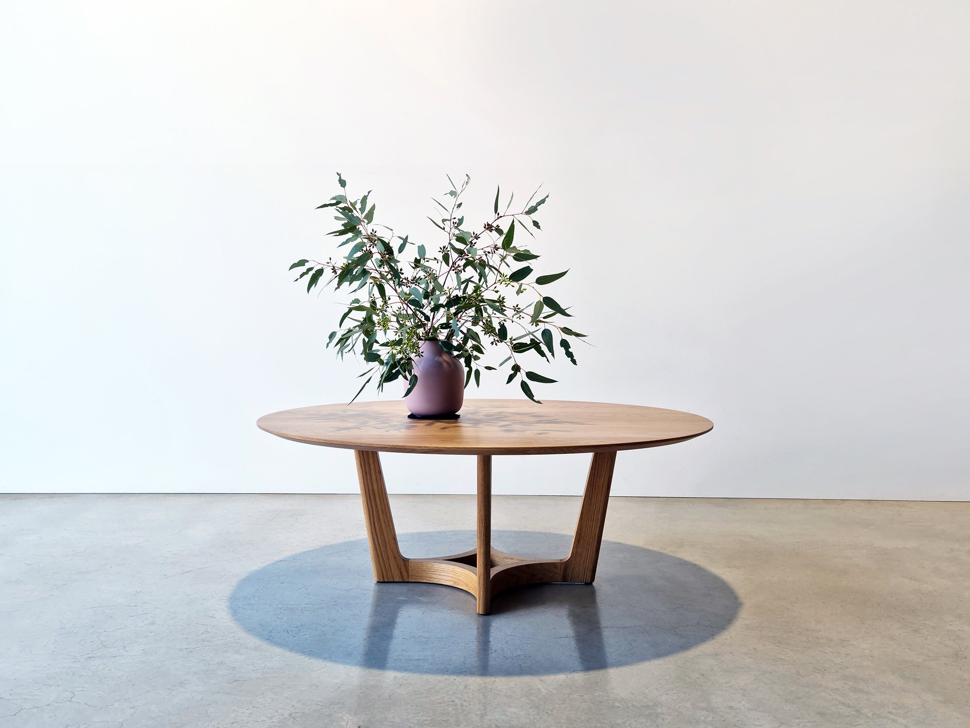 Froxfield Coffee Table in light oak, studio shot styled with native foliage - bespoke furniture by Nathan Day Design