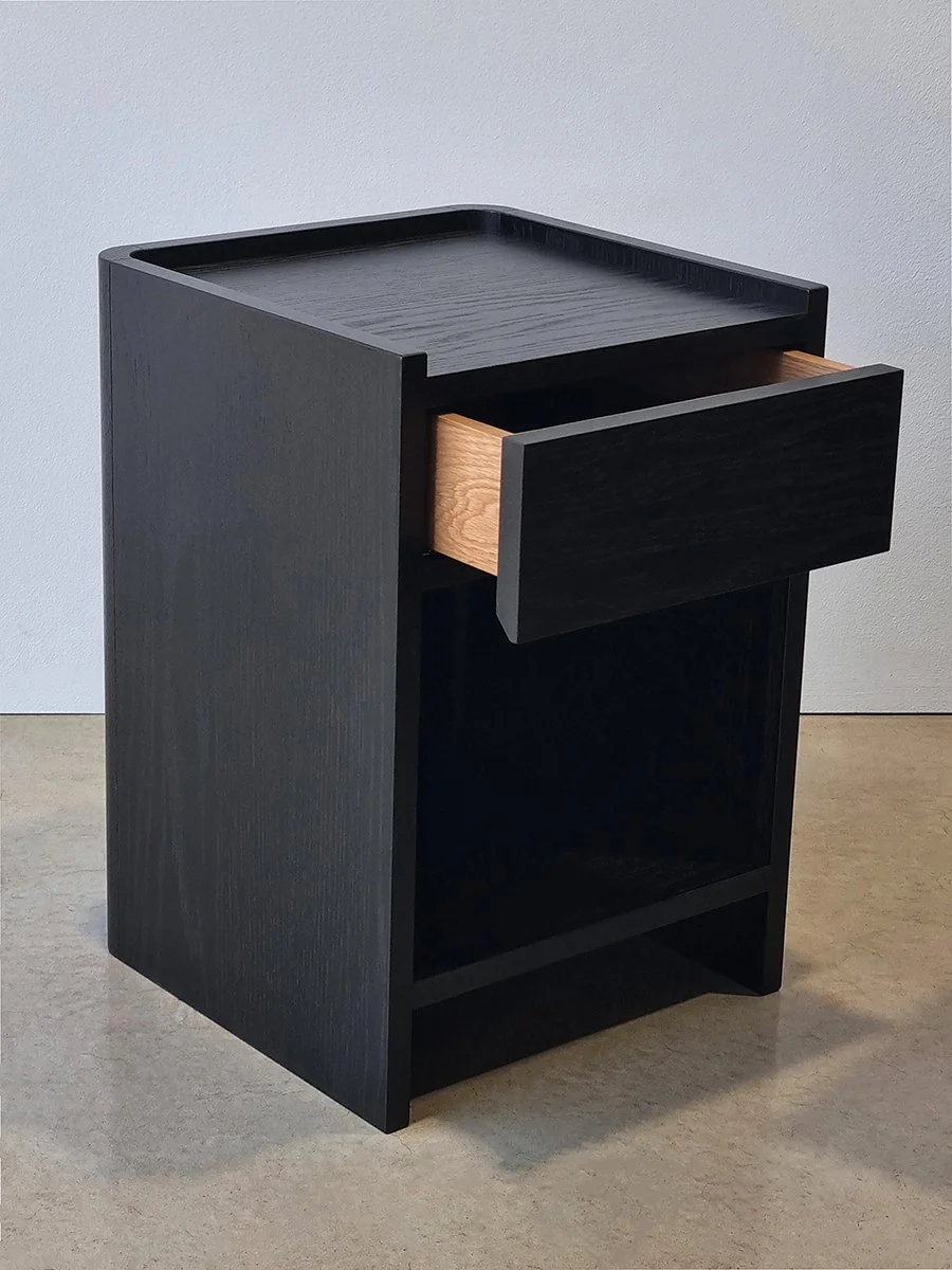 Majestic Close Bedside Table in ebonised Oak - Nathan Day Design, front elevation view outdoors