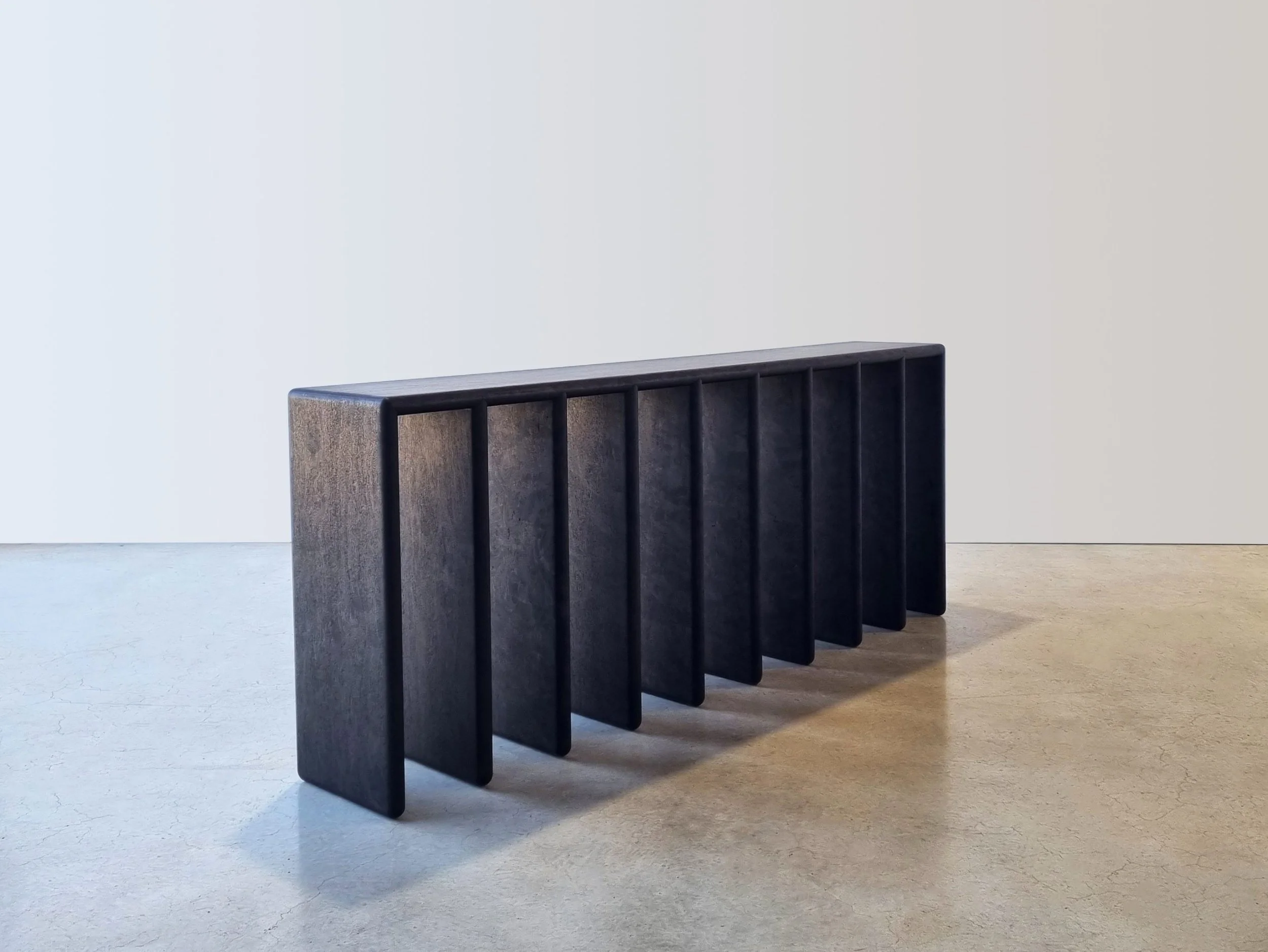 Millipede Console in ebonised Jarrah, sculptural fin-leg design, full side view - Nathan Day Design