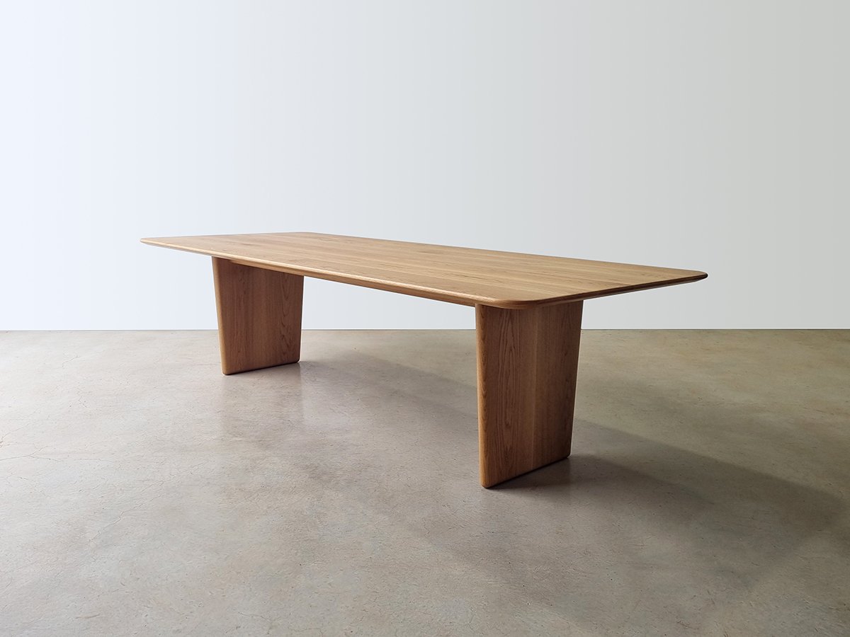 Morey Table in American Oak, minimalist slab-leg design - bespoke furniture by Nathan Day Design