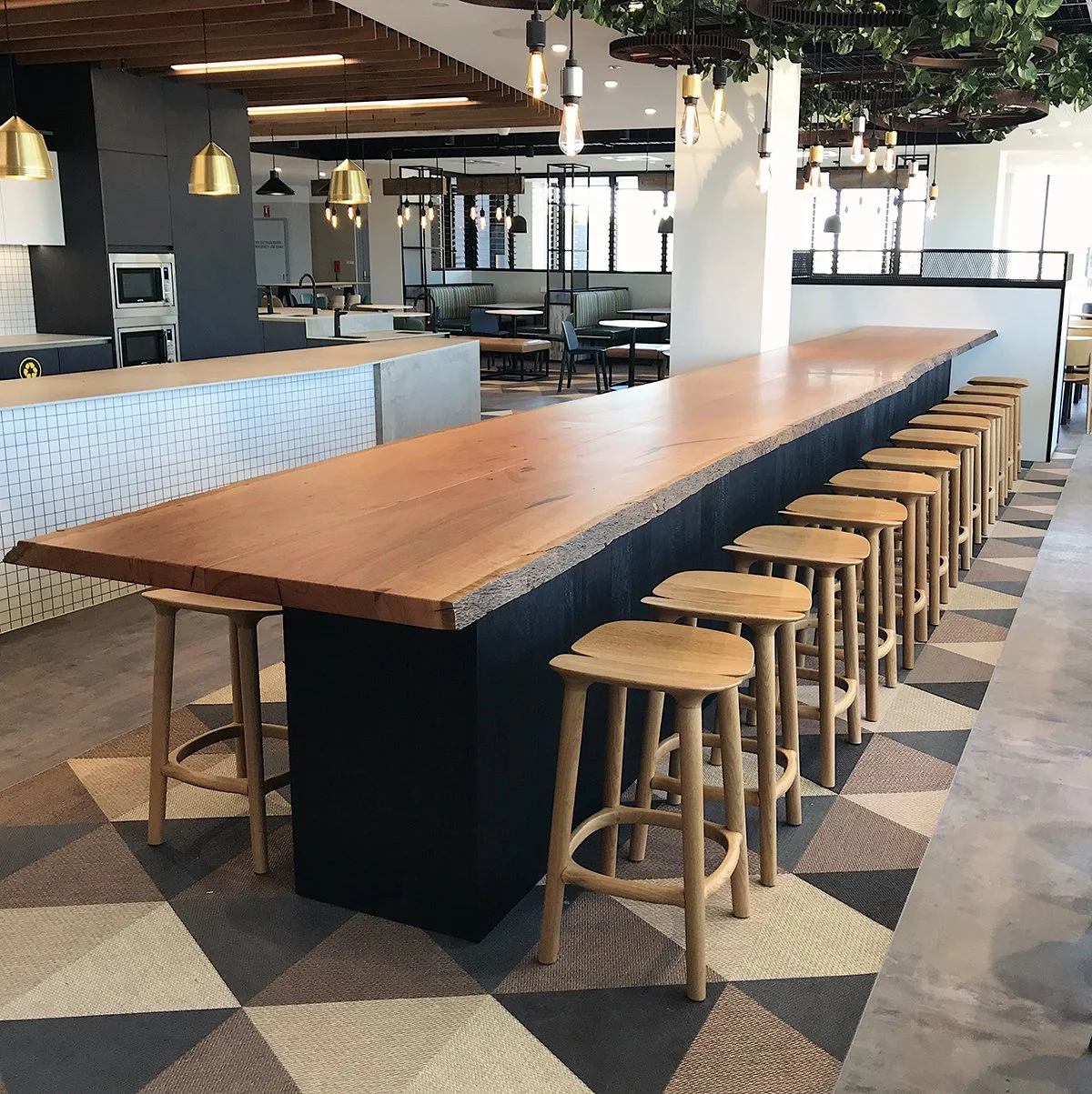 DWER custom furniture in WA Blackbutt - Nathan Day Design, full live-edge bar counter with stools in staff kitchen