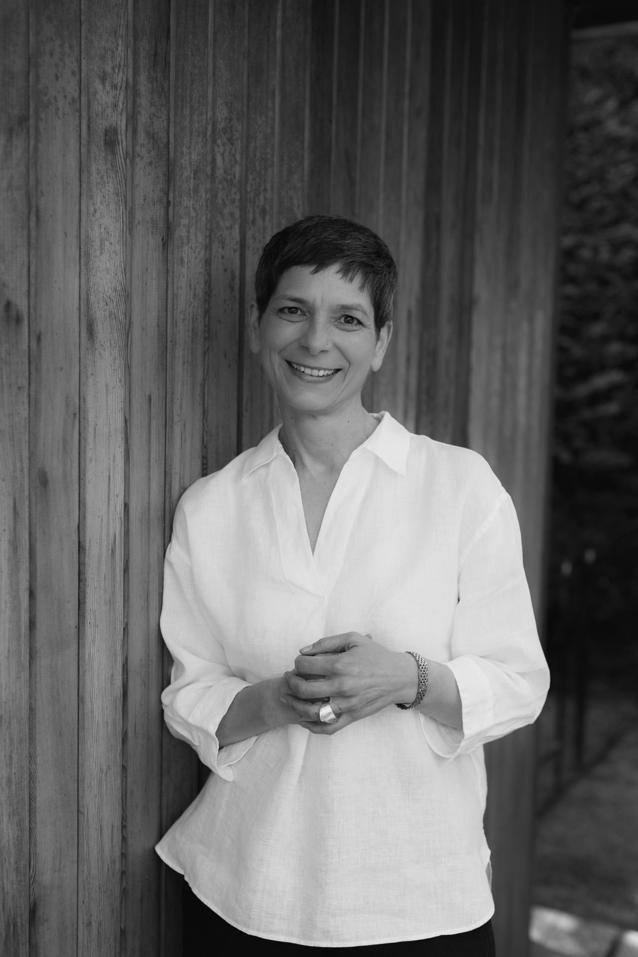 Black and white photo of a smiling woman acupuncturist based in Letchworth