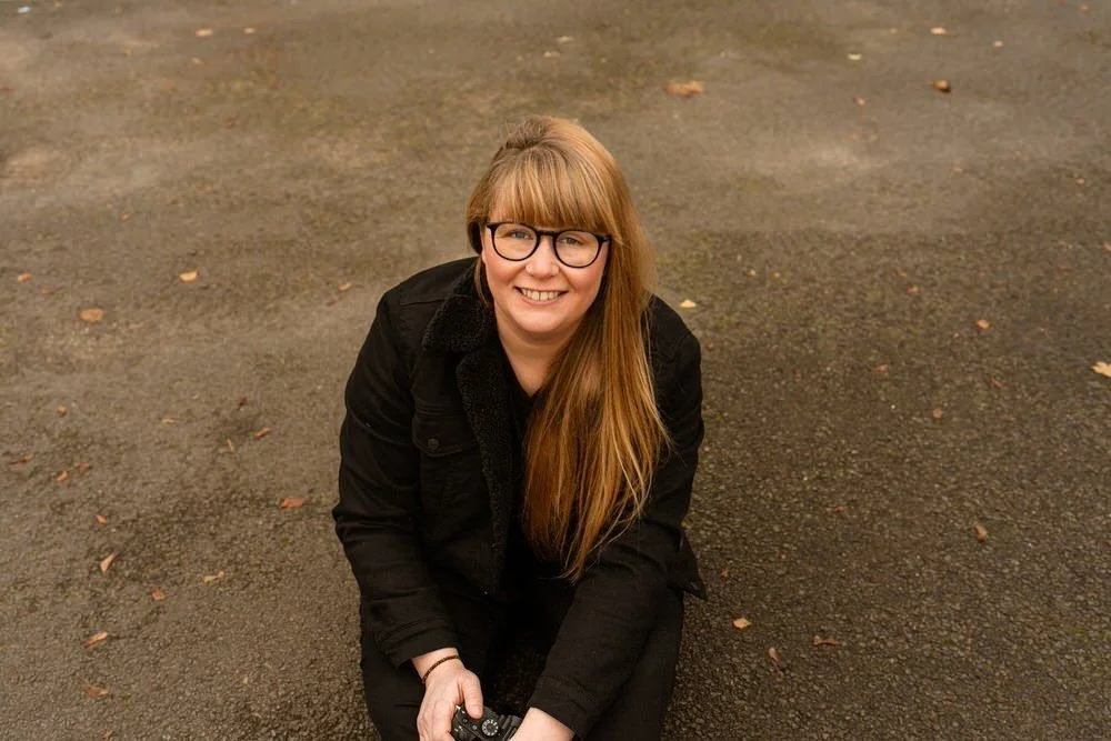 Portrait of female wedding photographer Amy Reed.