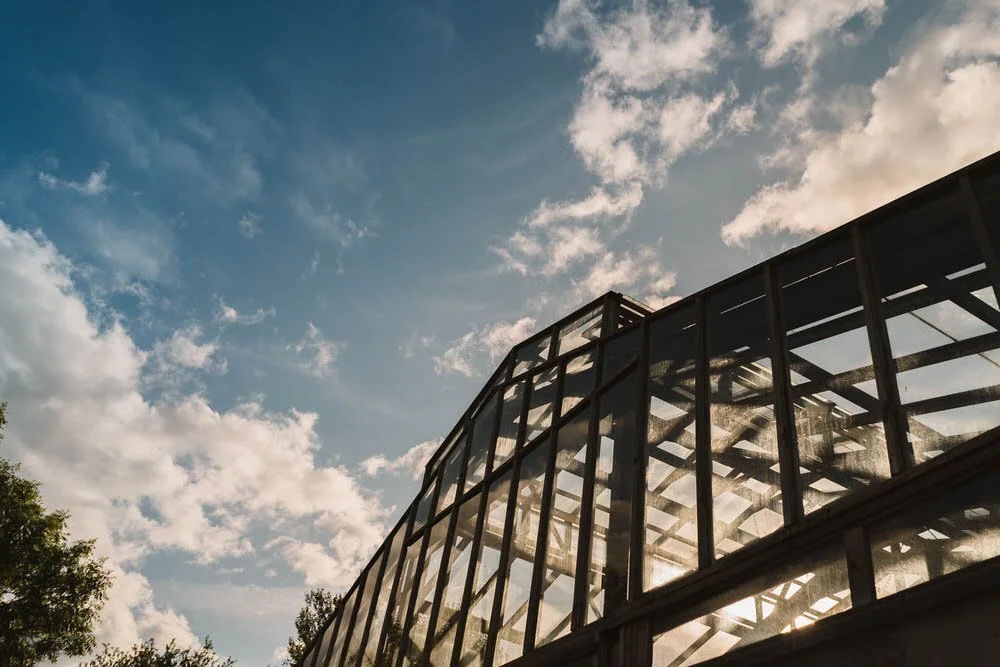 Exterior view of glass barn at the Anrán wedding venue
