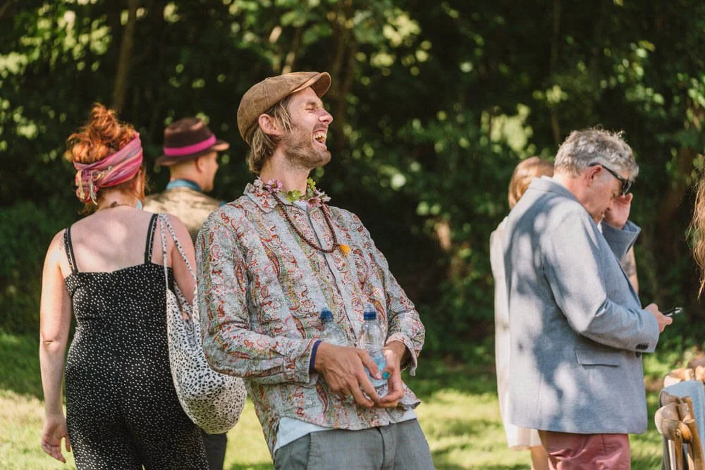 Laughing wedding guest