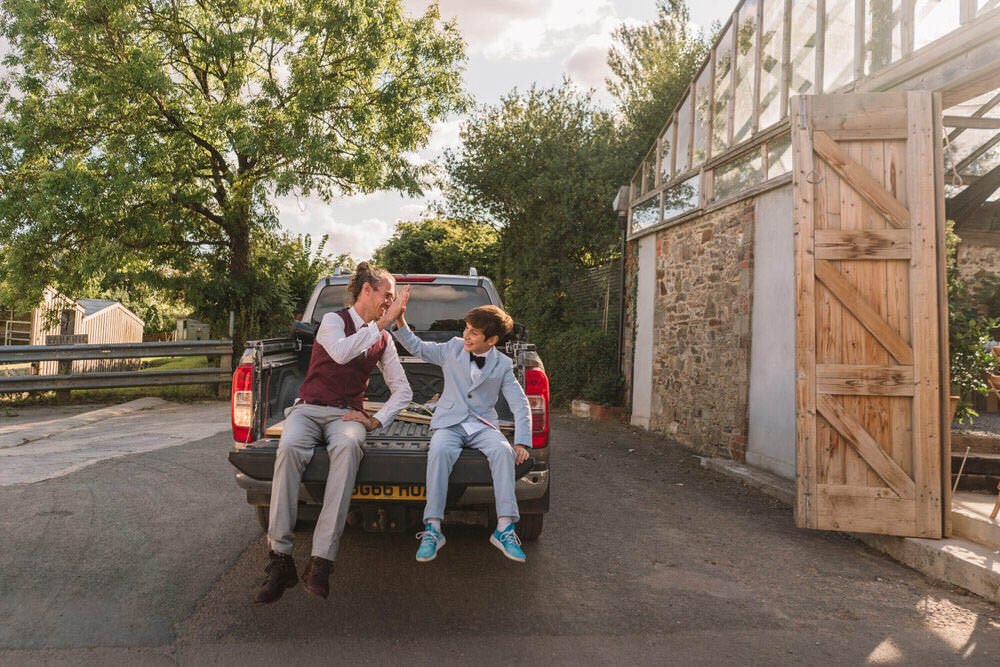 boys on back of truck