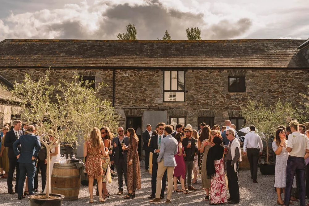 Wedding guests in courtyard at the Anrán.